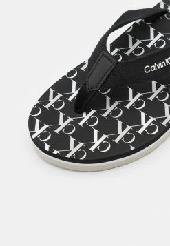 Calvin Klein Jeans UNISEX - Tongs - Black 8 Calvin Klein Jeans UNISEX - Tongs - Black -Calvin Klein Elegant Magasin 004f261baa8a4412a74363c856852946