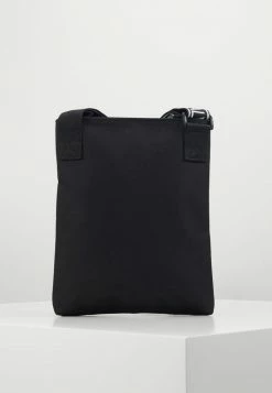 Calvin Klein Jeans FLATPACK - Sac Bandoulière - Black -Calvin Klein Elegant Magasin 0431283241e544c4a78da25695fcaaff