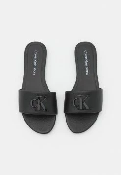 Calvin Klein Jeans FLAT - Mules - Black -Calvin Klein Elegant Magasin 04c9e8c5249c48e4afa88ffd6e0a8721