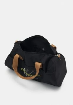 Calvin Klein Jeans SPORT ESSENTIALS DUFFLE - Sac Week-end - Black -Calvin Klein Elegant Magasin 05835cbe730e49a79688e11be6345968