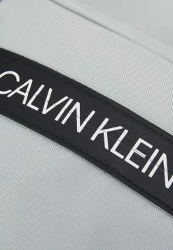 Calvin Klein Jeans LOGO TAPE BACKPACK UNISEX - Sac à Dos - Grey Dew -Calvin Klein Elegant Magasin 07000c69823a4425a1f0aba642b54eea