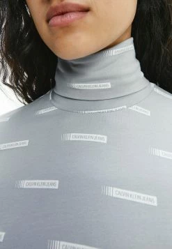 Calvin Klein Jeans LOGO ALL OVER PRINT ROLL NECK - T-shirt à Manches Longues - Grey -Calvin Klein Elegant Magasin 07306569e72f4b84aa88d1b79046ca08