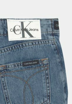 Calvin Klein Jeans LOGO TAPE SKORT - Short En Jean - Denim Medium 7 Calvin Klein Jeans LOGO TAPE SKORT - Short En Jean - Denim Medium -Calvin Klein Elegant Magasin 07a7dc3ff86c4a658ff8e39748e65869