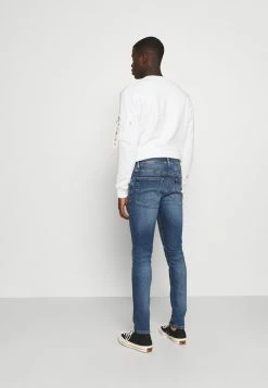 Calvin Klein Jeans SKINNY - Jeans Skinny - Blue -Calvin Klein Elegant Magasin 0805912e7e364213b0a96682ff485871