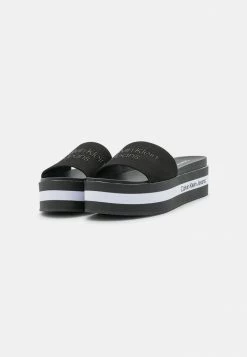 Calvin Klein Jeans FLATFORM SLIDE - Mules à Talons - Black -Calvin Klein Elegant Magasin 0ac1bc91663c4f23b742145b6c08df24