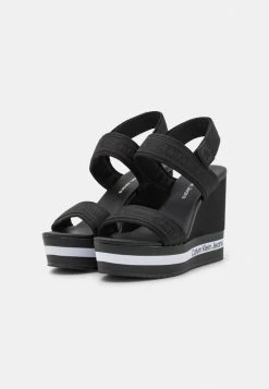 Calvin Klein Jeans WEDGE SLING - Sandales à Talons Hauts - Black -Calvin Klein Elegant Magasin 0f90a498994e42268e0d2d164c709a09