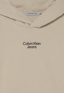 Calvin Klein Jeans STACKED LOGO RELAXED HOODIE UNISEX - Sweat à Capuche - Eggshell -Calvin Klein Elegant Magasin 119f9d86f87c48b0a1c98892962ba614