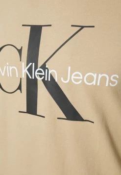 Calvin Klein Jeans SEASONAL MONOGRAM TEE - T-shirt Imprimé - Tawny Sand -Calvin Klein Elegant Magasin 12541513972e42ee9e5eef7902d707d5