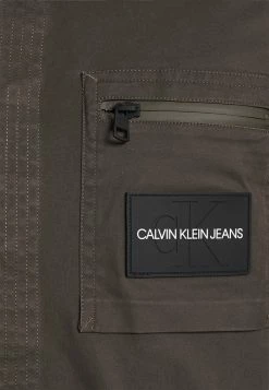 Calvin Klein Jeans UTILITY REGULAR SHIRT - Chemise - Black Olive -Calvin Klein Elegant Magasin 129e4059525e4817893727ca5d1f9895