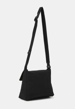 Calvin Klein Jeans CITY SMALL FLAP XBODY - Sac Bandoulière - Black -Calvin Klein Elegant Magasin 1343ee8c71c341c8b5022e82a13b8ad1
