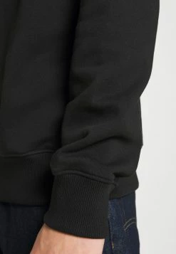 Calvin Klein Jeans MONOGRAM CREW NECK - Sweatshirt - Black -Calvin Klein Elegant Magasin 155c2e81150e468b8f8beaa93d465db6