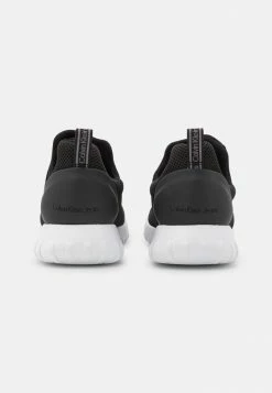 Calvin Klein Jeans SPORTY RUNNER EVA - Mocassins - Black -Calvin Klein Elegant Magasin 16b273a6e8fb44c7a1173eb2a00f2fc9