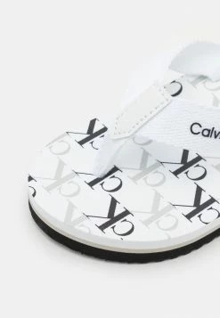 Calvin Klein Jeans UNISEX - Tongs - White 11 Calvin Klein Jeans UNISEX - Tongs - White -Calvin Klein Elegant Magasin 183f251f34444672a372969d03bdc8b1