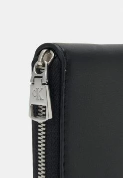 Calvin Klein Jeans SCULPTED ZIP AROUND TWO TONE - Portefeuille - Black -Calvin Klein Elegant Magasin 19183239f0284c6d89aafd4a33c8f8dd