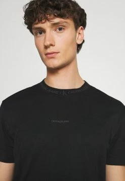 Calvin Klein Jeans LOGO TEE UNISEX - T-shirt Imprimé - Black 11 Calvin Klein Jeans LOGO TEE UNISEX - T-shirt Imprimé - Black -Calvin Klein Elegant Magasin 1d3f59bb716245828c80f152ac12a8f1