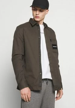 Calvin Klein Jeans UTILITY REGULAR SHIRT - Chemise - Black Olive -Calvin Klein Elegant Magasin 1d9aa1eb8f92439f9c5b9f20f883234c