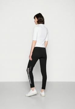 Calvin Klein Jeans VERTICAL INSTITUTIONAL - Legging - Black -Calvin Klein Elegant Magasin 21d47b2b0cb943b79bbec6902b27ff04
