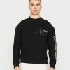 Calvin Klein Jeans DYNAMIC CREW NECK UNISEX - Sweatshirt - Black