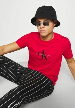 Calvin Klein Jeans ARCHIVAL MONOGRAM TEE UNISEX - T-shirt Imprimé - Salsa/black -Calvin Klein Elegant Magasin 2328cea0b92b42289283ffa42bdb1375