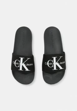 Calvin Klein Jeans SLIDE MONOGRAM - Mules - Black 11 Calvin Klein Jeans SLIDE MONOGRAM - Mules - Black -Calvin Klein Elegant Magasin 24b86004d81d460c918b4ed817560916