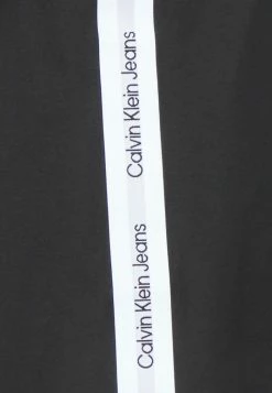 Calvin Klein Jeans SIDE CONTRAST TAPE T-SHIRT DRESS - Robe En Jersey - Black -Calvin Klein Elegant Magasin 260c766b18af49dab773a36193a5a012