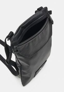 Calvin Klein Jeans UTILITY GRID XBODY UNISEX - Sac Bandoulière - Black -Calvin Klein Elegant Magasin 270b3b6475034459af09cce23b3a9743
