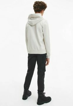 Calvin Klein Jeans SMALL MONOGRAM HOODIE UNISEX - Sweatshirt - Eggshell -Calvin Klein Elegant Magasin 273261e759d34ddba2dbe20c56082677