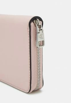 Calvin Klein Jeans SCULPTED MONO ZIP AROUND - Portefeuille - Pale Conch Shell -Calvin Klein Elegant Magasin 28da5848d357445b84f03f246966fe96