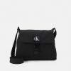 Calvin Klein Jeans CITY SMALL FLAP XBODY - Sac Bandoulière - Black