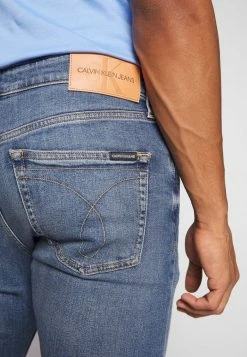 Calvin Klein Jeans SLIM TAPER - Jean Slim - Dark Blue 9 Calvin Klein Jeans SLIM TAPER - Jean Slim - Dark Blue -Calvin Klein Elegant Magasin 2db30b2e7b2944c1b2fed8bc777622a8