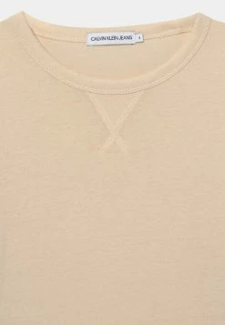 Calvin Klein Jeans BADGE - T-shirt à Manches Longues - Muslin -Calvin Klein Elegant Magasin 2f46f94f5c894cffbbc489396796e44f