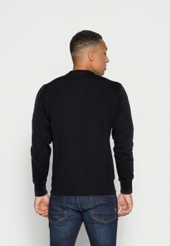 Calvin Klein Jeans MONOGRAM SLEEVE BADGE - Sweatshirt - Black -Calvin Klein Elegant Magasin 3001900e45104a069d32fe5179a4b855