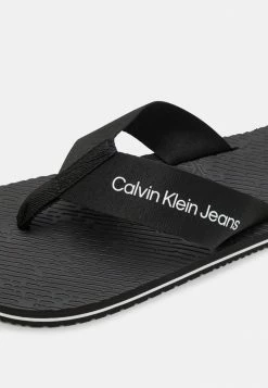 Calvin Klein Jeans Tongs - Black 11 Calvin Klein Jeans Tongs - Black -Calvin Klein Elegant Magasin 30c6d50194c9413c98f155cf240079de