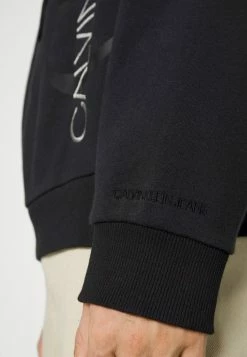 Calvin Klein Jeans DOUBLELAYER VERTICAL PUFF HOODIE UNISEX - Sweatshirt - Black -Calvin Klein Elegant Magasin 31095312a6be45f4882eb68ae7bff168