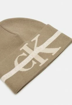 Calvin Klein Jeans MONOGRAM TAPE BEANIE UNISEX - Bonnet - Crockery -Calvin Klein Elegant Magasin 32fc0419d032463c815a1e4d2bc561d5