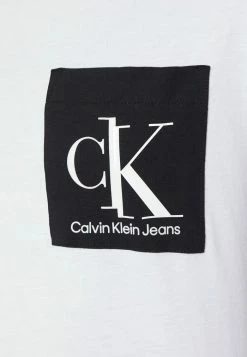 Calvin Klein Jeans SPLICED POCKET TEE - T-shirt Imprimé - Bright White -Calvin Klein Elegant Magasin 33897311f7b44c689e9e6dc1993926bc