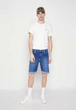Calvin Klein Jeans SLIM - Short En Jean - Denim Medium -Calvin Klein Elegant Magasin 344aa8a3675d48ecbdaa7f09e4cd7349