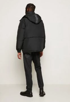 Calvin Klein Jeans BLOCKING HOODED PUFFER - Veste D'hiver - Black -Calvin Klein Elegant Magasin 356140b46e484c44bb64213af6fe30e6