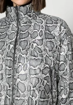 Calvin Klein Jeans REVERSIBLE PADDED JACKET - Veste Mi-saison - Black -Calvin Klein Elegant Magasin 370ac542ea2847988f340d29dda98c0b