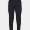 Calvin Klein Jeans OFF PLACED ICONIC PANT - Pantalon De Survêtement - Blue