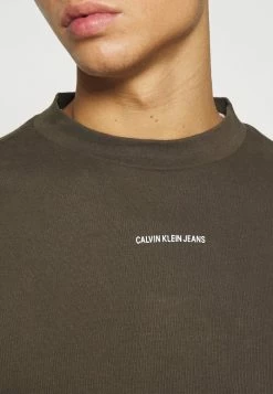 Calvin Klein Jeans MICRO BRANDING - T-shirt à Manches Longues - Black Olive -Calvin Klein Elegant Magasin 396bbd0c8d9443cb985063cfe7c5ee1f