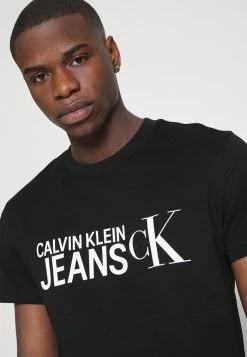 Calvin Klein Jeans SEASONAL INSTITUTIONAL TEE - T-shirt Imprimé - Black -Calvin Klein Elegant Magasin 3bad5b846fa64ceda62efbd456a4522c