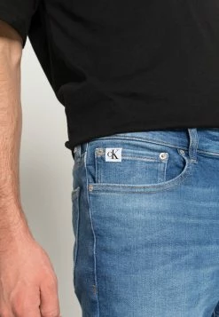 Calvin Klein Jeans SUPER SKINNY - Jeans Skinny - Denim Medium -Calvin Klein Elegant Magasin 3ccc5c24c8d14dbca822fd5511b96bc2