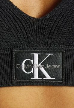 Calvin Klein Jeans BADGE RALETTE - Débardeur - Black -Calvin Klein Elegant Magasin 3d801150f6374d98807cac2badcd56b3