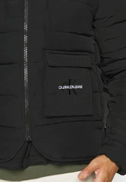 Calvin Klein Jeans URBAN PUFFER JACKET 2-IN-1 - Veste D'hiver - Black -Calvin Klein Elegant Magasin 3e85b06ccecc451e9a00e6d0b9125981
