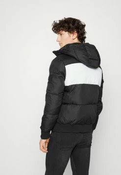Calvin Klein Jeans SPLICED PUFFER - Veste D'hiver - Black -Calvin Klein Elegant Magasin 3e998348596a45e0ad5e11cef778a950