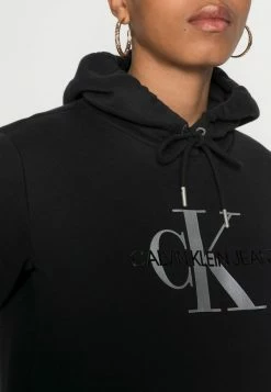 Calvin Klein Jeans GLOSSY MONOGRAM HOODIE DRESS - Robe De Jour - Black -Calvin Klein Elegant Magasin 4132bbf170614479893649f59d67f26a