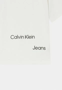 Calvin Klein Jeans DISRUPTED LOGO UNISEX - T-shirt Imprimé - Ivory -Calvin Klein Elegant Magasin 41eaa46f17784bc1b0c4aef2601c3a01