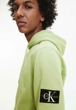 Calvin Klein Jeans MONOGRAM SLEEVE BADGE - Sweat à Capuche - Green -Calvin Klein Elegant Magasin 427a2ab25a854d5e90bfe1f5bdda757a