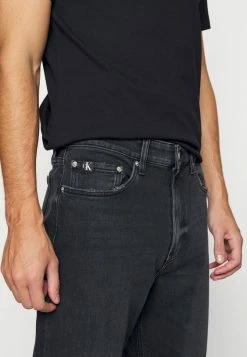 Calvin Klein Jeans REGULAR TAPER - Jean Droit - Black Denim -Calvin Klein Elegant Magasin 468b1ccb706a45f0aad11ece5970dec0